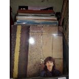 A box of LPs to include Paul McCartney, George Harrison, Band on the Run, Venus and Mars, Ringo