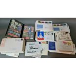 A box and a small album of GB commemorative stamps and FDCs.