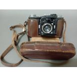 A vintage Zeiss Ikon Super Nettel camera.