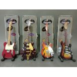 4 replica mini guitars by Baby Axe - BA06 Rickenbacker; BA02 Telecaster; BA19 George Harrison