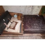 A wooden box containing Victorian ephemera - photos, a small box and a sheet music holder with music