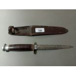 A WW2 William Rodgers commando type fighting knife, design of the Fairbairn-Sykes, with wooden