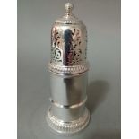 A hallmarked silver sugar sifter, Birmingham, 1960, gross weight 4.4 ozt.