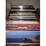 A box of LPs to include Dire Straits, House of the Holy, Bob Marley, Elton John, Simon and