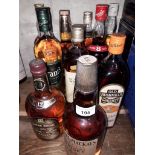 A selection of 10 bottles of whisky to include Chivas Regal, Whyte & Mackays, Old Bushmills,