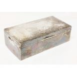A hallmarked silver cigarette box, length 18cm.