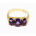 A purple stone ring, marked '14K' and '585', gross wt. 4.7g, size P.