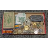 A box of assorted items including a WWI pair award to lieutenant R Haddock, yellow metal, bank