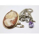 A hallmarked 9ct gold mounted shell cameo brooch and a CZ set pendant on chain marked 'Tiffany &