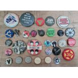 A collection of vintage music related pin badges to include Stiff records, Elton John, Simon Le Bon,