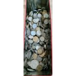 A tin box of various GB coins to include threepences, half crowns, two shillings, one shillings
