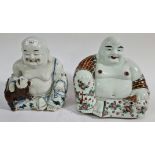 A pair of Chinese porcelain buddhas.
