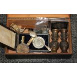 A box and contents including a pair of miniatures eastern vases, a hallmarked silver teaspoon,