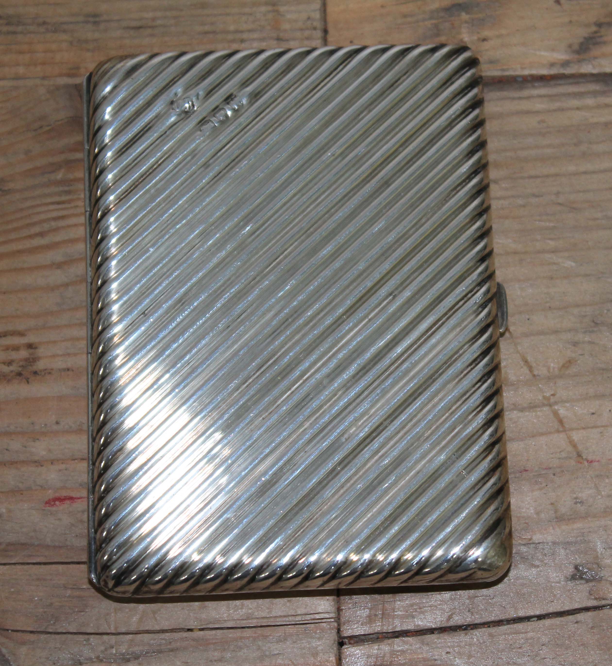 A Victorian silver wallet/note pad case, leather interior with pencil, London 1877, 10cm x 7.5cm.