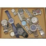 Assorted modern watches including Fossil, Timberland, Accurist and Swatch etc.