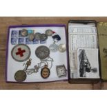 A mixed lot including five hallmarked silver golf badges, an Edwardian hallmarked silver Ambulance