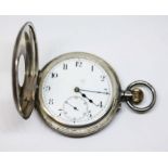 A silver half hunter pocket watch, diameter 50mm.