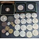 A tin of various commemorative crowns, five shillings,tokens and a boxed Irish shilling etc.