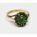 A hallmarked 9ct gold turquoise cabochon cluster ring, gross wt. 2.5g, size K.