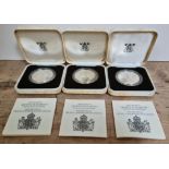 Royal Mint, three 1980 Queen Mother silver proof crowns, in cases with certificates.