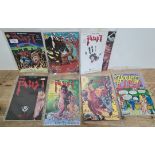 A small collection of comics to include Young Lust n2 and Quinn Vigil Faust Act 1-6.