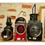 Two British Rail railway lamps and a Watchman road lamp