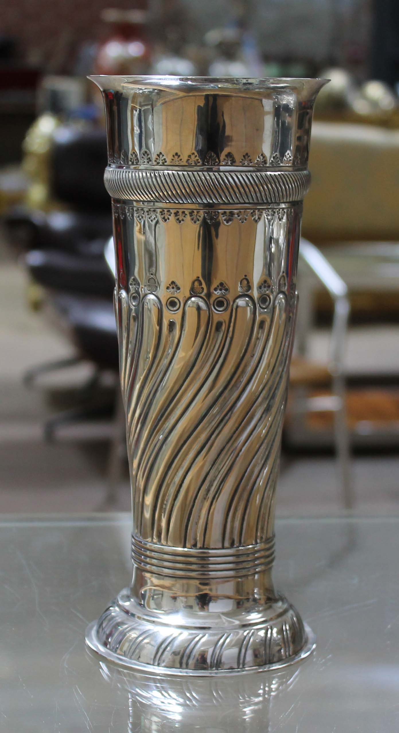 A Victorian silver vase, twist gadrooned design, Goldsmiths and Silversmiths Co, London 1896, heig