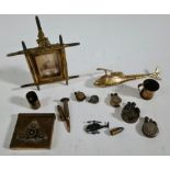 Assorted trench art including coin lighters, photograph frame, cigarette case, Shell Mex oil can cap