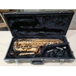 A Jupiter brass alto saxophone.