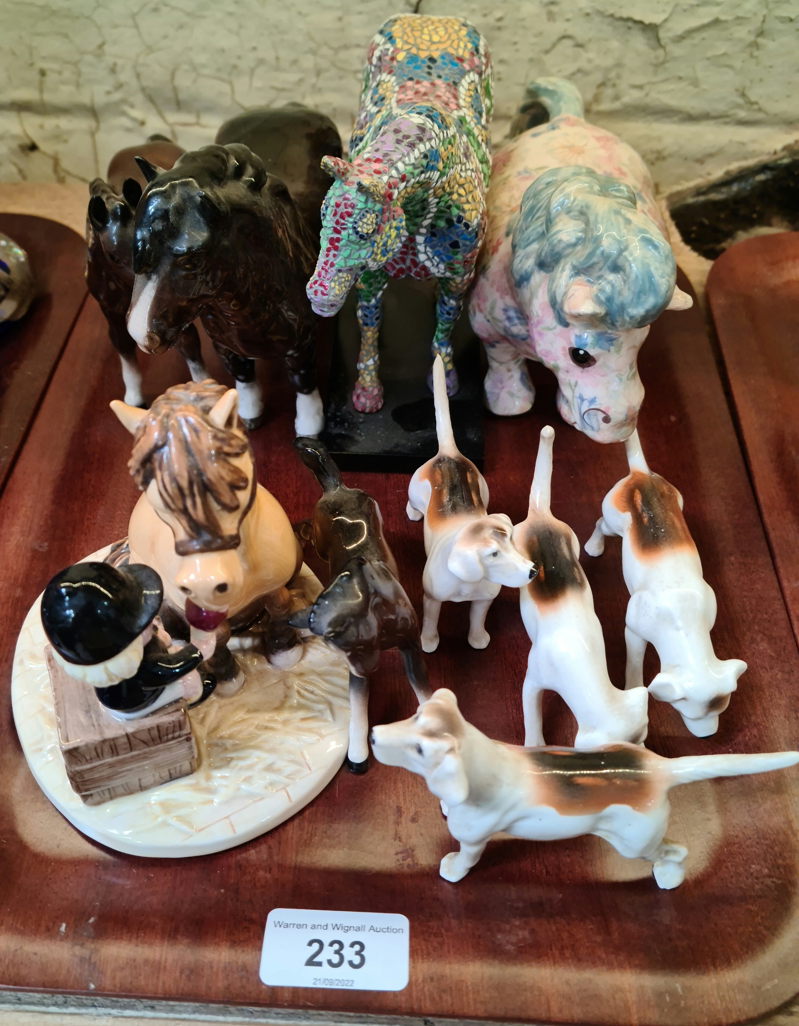 Assorted Royal Doulton and Beswick animals including dogs, ponies etc.