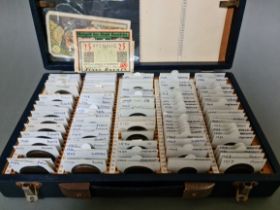 A coin collectors case containing various UK coins.