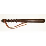 An early 20th century rosewood truncheon, length 39cm.