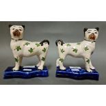 A pair of continental pug dogs, George III period.