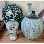 A group of four red clay green glaze Oriental vases, tallest 31cm.