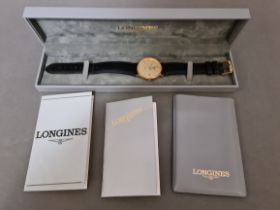A gent's gold plated Longines Presence wristwtach, with box and papers.