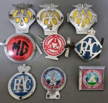 A box of car badges to include AA, RAC, MG & IAM etc.