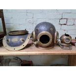 A bolt copper and brass diving helmet with cross banded oval side ports, rear telephone junction,