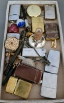 A bag of cigarette lighters and collectables including Zippos etc.