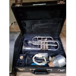 A Besson 600 cornet, engraved 'Besson, London 600, Boosey & Hawkes, England', in case