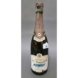 A 1966 Heidsieck & Co Reims Dry Monopole champagne bottle.