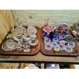 Two trays of glass items and ornaments to include paperweights, napkin rings, vases, animals, etc.