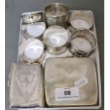 A selection of silver and silver plated items including napkin rings, card case, etc. Gross weight
