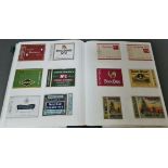 An album of vintage cigarette advertisments & vintage cigarette packets.