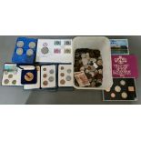A tub of UK & world coins, 2 x 10 shillings notes and various coin sets.