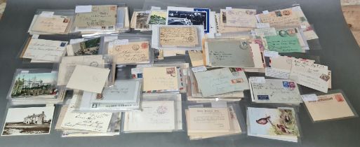 A large collection of vintage postcards, stamps and ephemera etc.