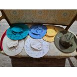 A collection of cricket sun hats (3 with autographs) together with a ranger felt hat.