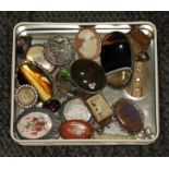 A box containing vintage brooches including silver, various agate varieties, etc.