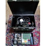 A Singer portable electric sewing machine, model no. 221K1 with accessories, pedal and