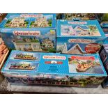 Boxed Sylvanian families toy sets; Canal Boat, St John's School and Bramble Cottage.