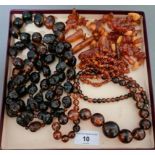 Assorted amber and similar beads.